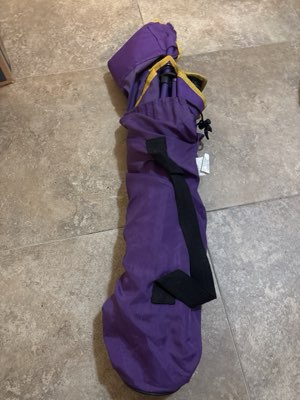 Camping chair, purple, in its carry bag