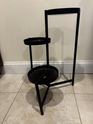 Tiered plant stand, black metal, three tiers