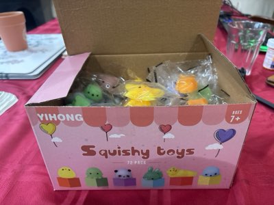 Squishy toys in a pink box