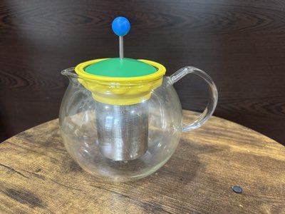 Glass tea press with infuser