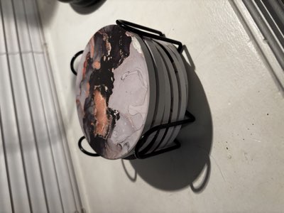 Coasters in a wire holder